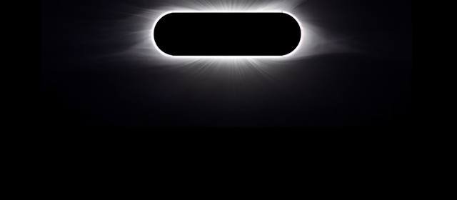 Top edge of the wallpaper “Corona”: a ring of light sits exactly where the iPhone’s cutout is.