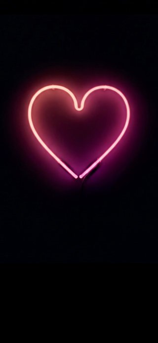 The wallpaper “Neon Heart” as a still image.